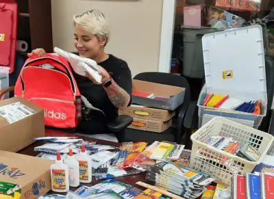 volunteer-helping-with-donation-box